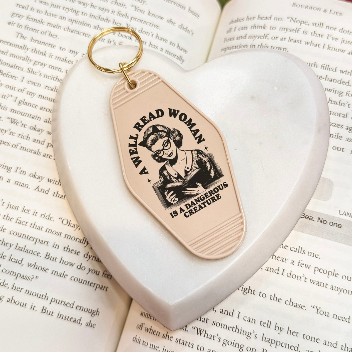 A Well Read Woman Is A Dangerous Creature Motel Keychain - Starry Skies Austin